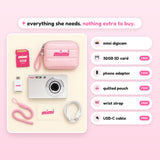 Everything in the Mimi box: digicam plus free SD card, phone adapter, quilted pouch, wrist strap and USB-C cable